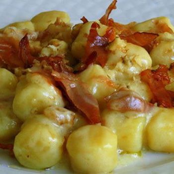 Home made gnocchi with cheese and bacon