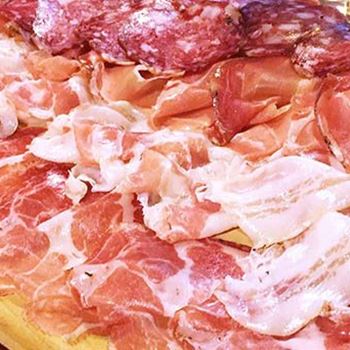 Appetizer of mixed cold cuts with cheeses