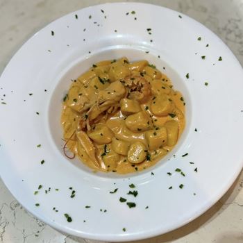 Home-made gnocchi with scampi sauce