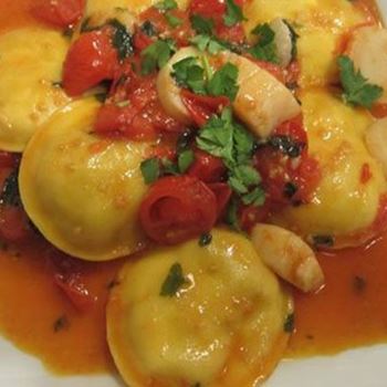 Panciotti with scallops, leek and cherry tomatoes